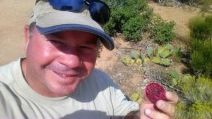 Tour Guide Dave eating Prickly Pear Fruit